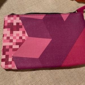 Ipsy bag with shades of pink